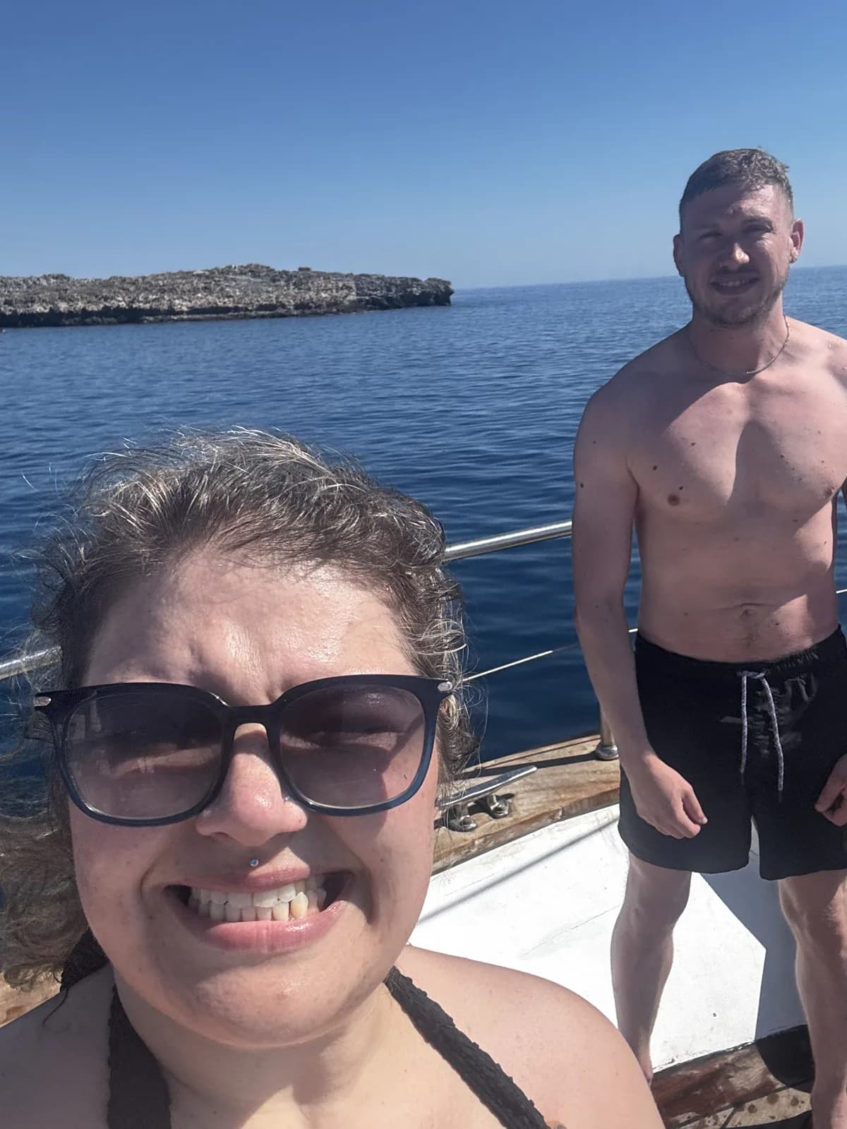 Boat deck selfie with the island behind us